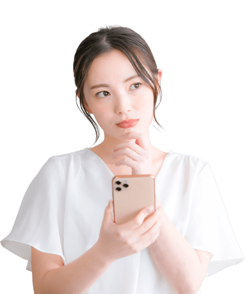 不安そうに頭を抱える女性