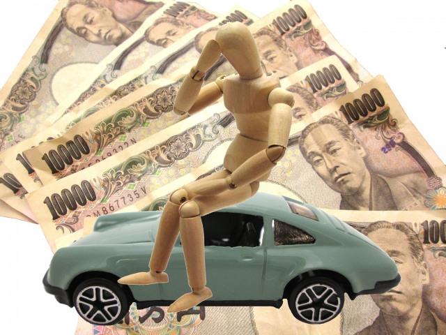 お金と車と人形